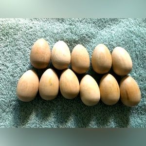 11 small wooden eggs for pretend play or crafting